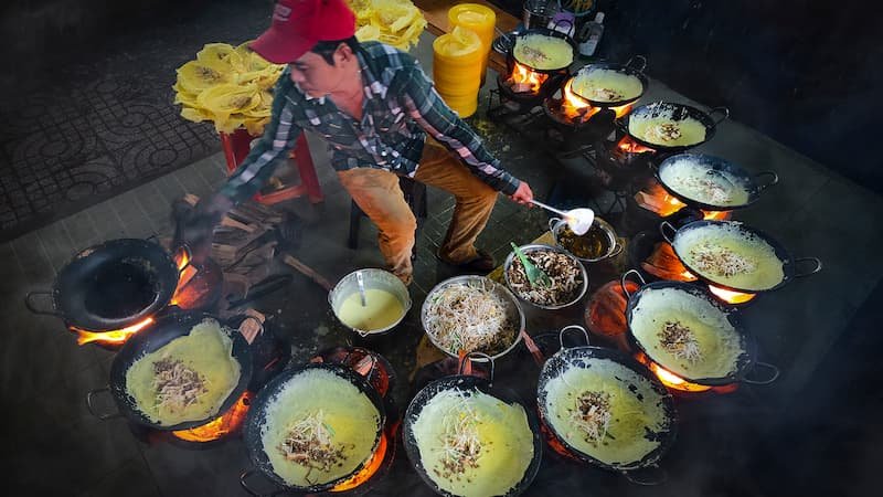 Bustling street food stall in Hanoi’s Old Quarter