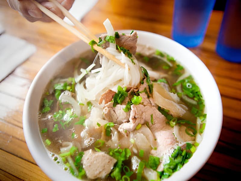 Authentic Hanoi phở with beef and herbs at Phở Thìn Lò Đúc