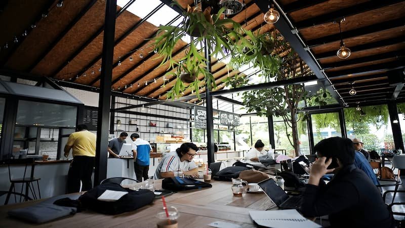 isbon coworking space bustling with the Best Cities in Portugal for Digital Nomads.