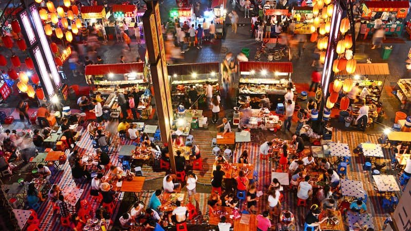 Lively night market scene in Hanoi