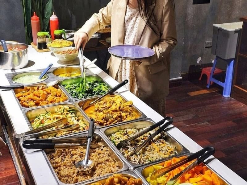 Extensive vegetarian buffet spread at Veggie Castle restaurant in Hanoi