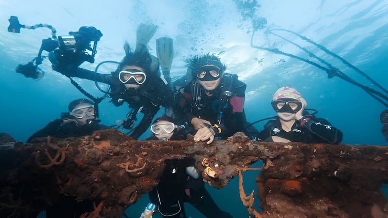 Coron, Palawan is a renowned scuba diving destination, famous for its World War II shipwrecks and vibrant marine life