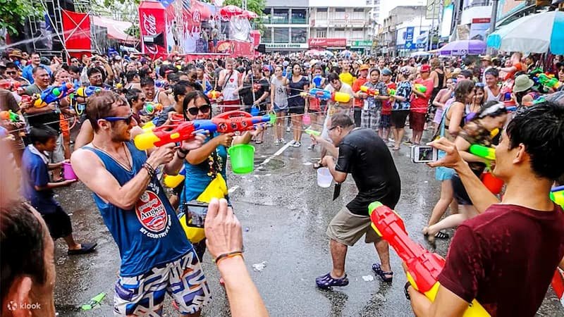 Intense water battles during Songkran at Silom