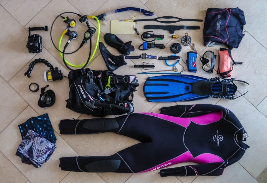 Essential equipment for beginner scuba diving Philippines adventure arranged in flat lay configuration