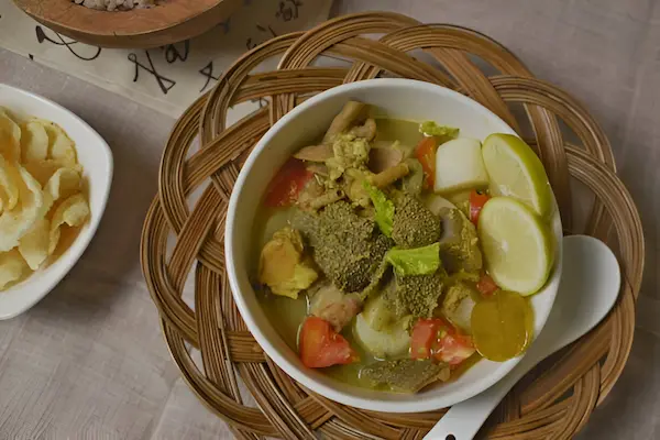Soto Betawi - Traditional Jakarta beef soup with coconut milk, aromatic herbs, and tender beef