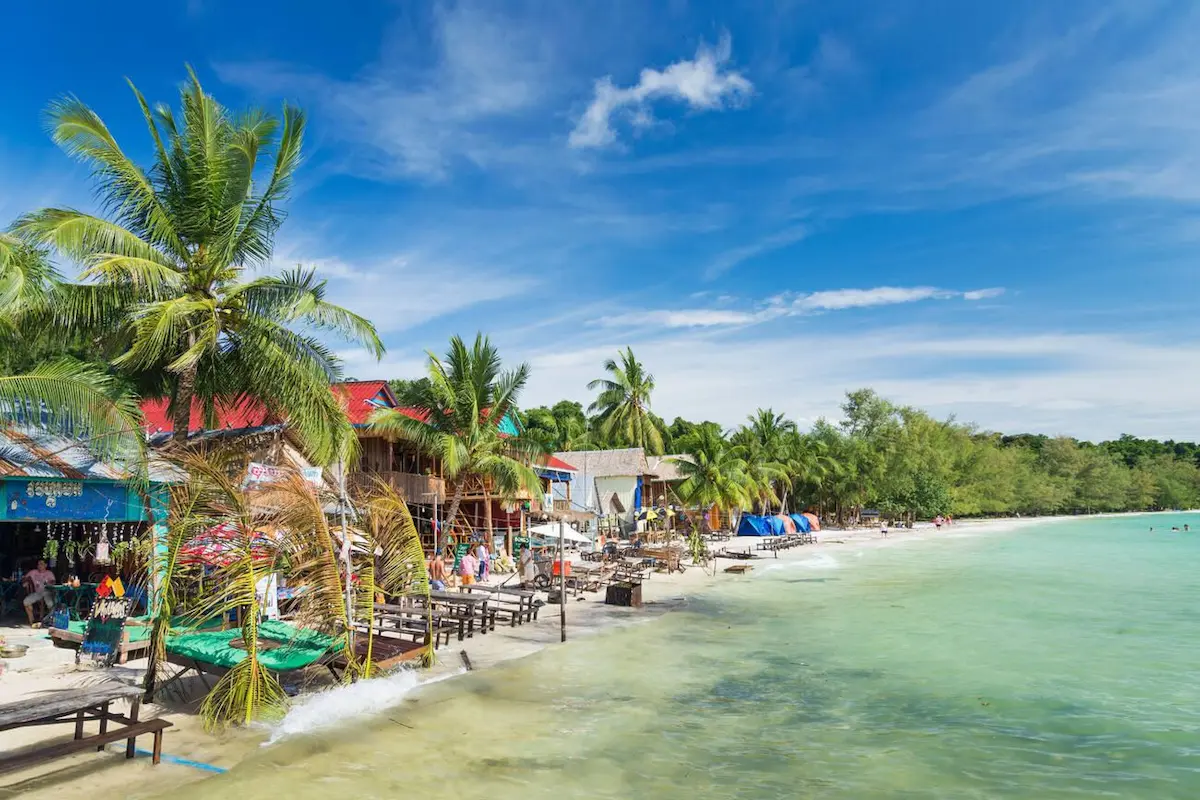 Pristine turquoise waters and white sand beaches on Koh Rong that rival Thailand's famous islands but with significantly fewer tourists and lower prices, making it one of Cambodia's best-kept budget secrets