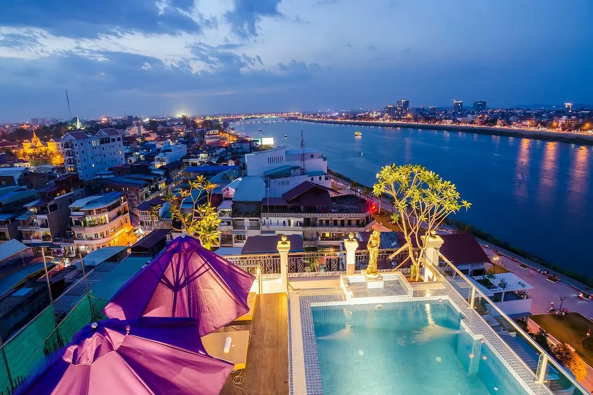 Cozy riverside guesthouse, lush garden, and Mekong River views