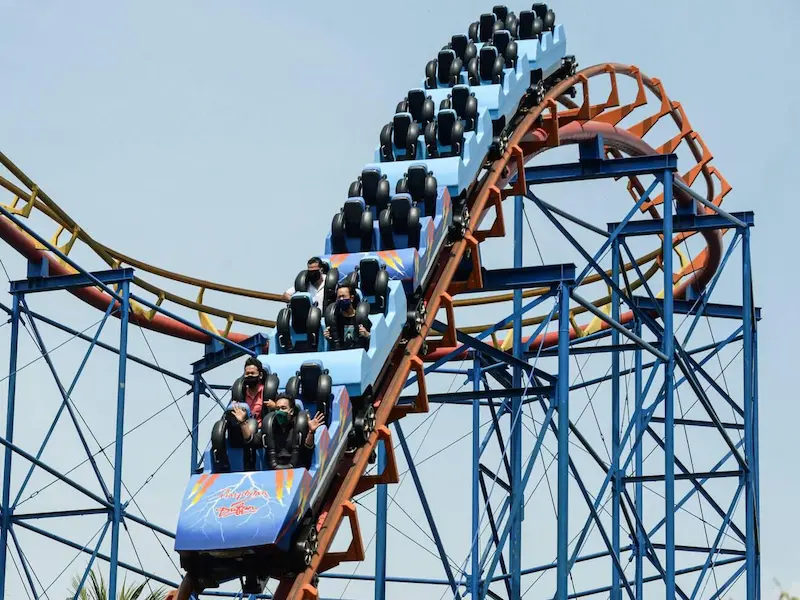 Colorful rides and attractions at Ancol Dreamland amusement park in Jakarta