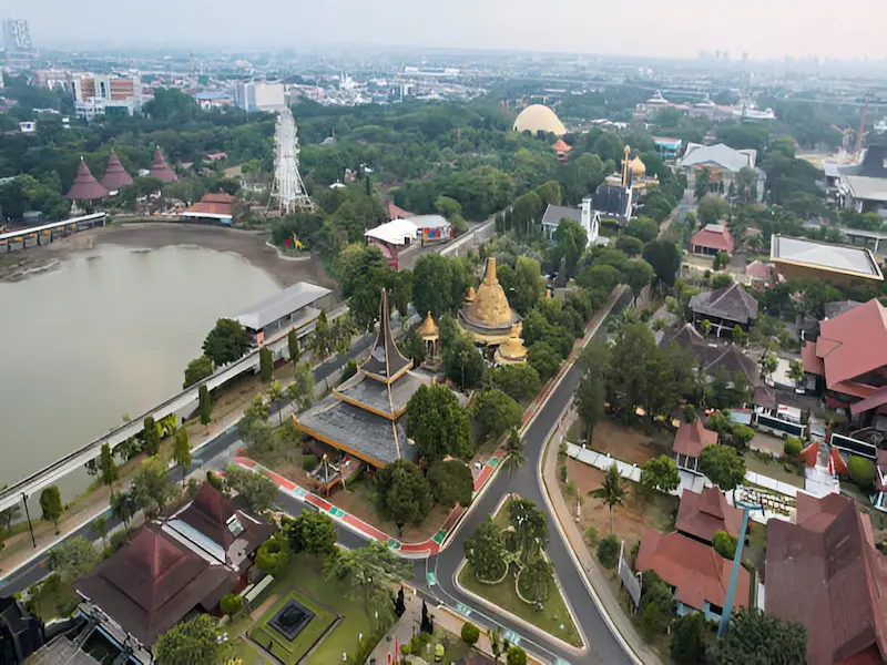 Aerial view of Taman Mini Indonesia Indah cultural park with pavilions and lakes