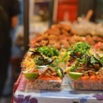 Vibrant Hanoi street food scene with Vietnamese dishes