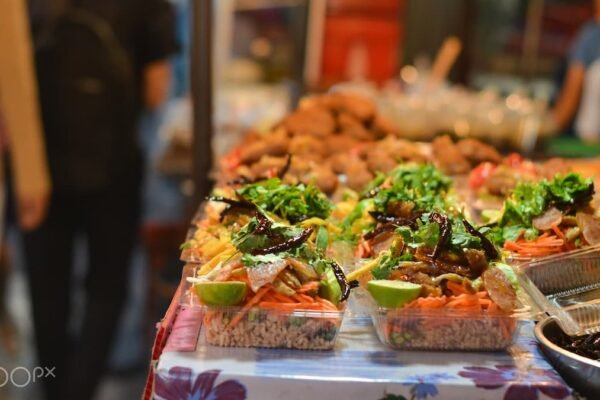 Vibrant Hanoi street food scene with Vietnamese dishes