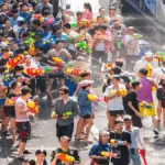 Songkran Water Festival in Thailand - People celebrating with water guns