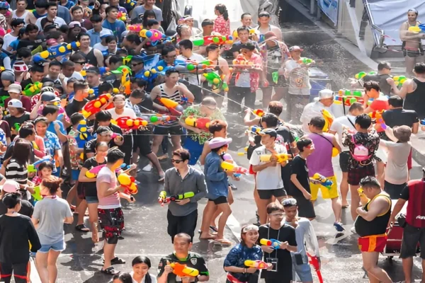 Songkran Water Festival in Thailand - People celebrating with water guns