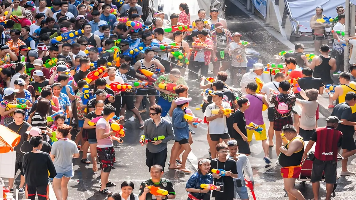 Songkran Water Festival in Thailand - People celebrating with water guns