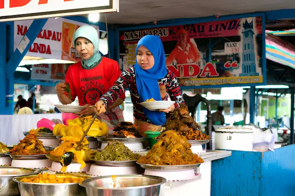 Street food vendors in Jakarta offering traditional Indonesian dishes